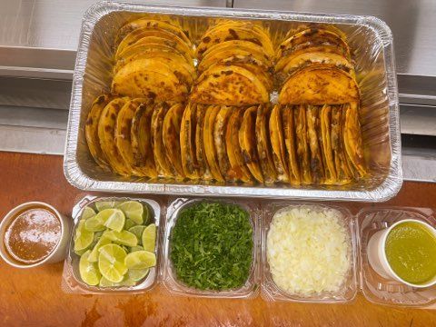 Party tray of golden fried specialties from So Sabroso