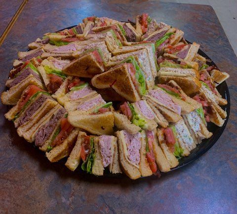 Party tray of assorted sandwiches from So Sabroso